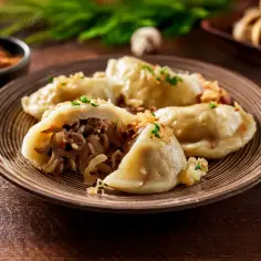 Pierogi z grzybami i kapustą - Przepis, farsz, smakowite danie